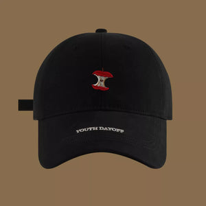 Black baseball cap with embroidered apple core detail and "YOUTH DAYOFF" text.