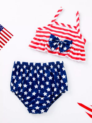 Baby outfit set with red and white striped top and star-print bloomer shorts.