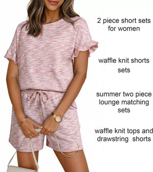 Pink waffle knit two-piece set with ruffled sleeves and drawstring shorts
