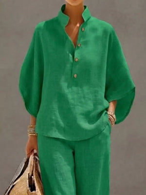 Green button-down loungewear set with a mandarin collar and wide sleeves.