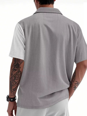 Men's light gray short sleeve button-down shirt with vertical pinstripe texture and color block white sleeve.