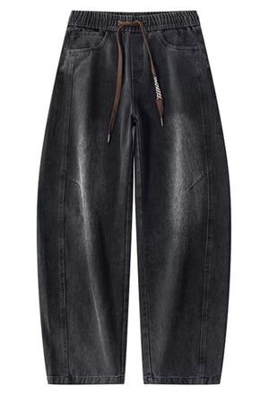 Men's black vintage wash wide-leg denim jeans with drawstring waist