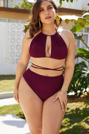 Keyhole halter bikini set in deep red with high-waisted bottoms and tie waist detail