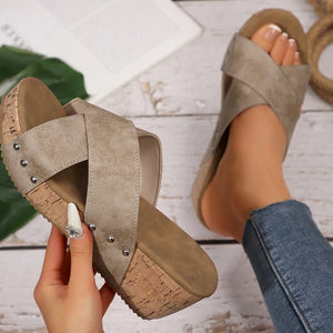 Crisscross studded cork wedge slides in Khaki with a cork wedge heel.