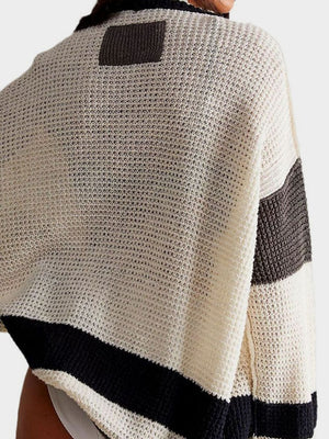 Textured knit cardigan with varsity stripes in cream, black, and dark grey.