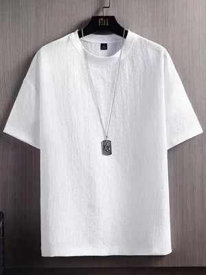 White textured round neck t-shirt for men with short sleeves and a subtle crinkle fabric detail.