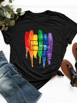 Black t-shirt with rainbow brushstrokes and "Love Wins" text graphic