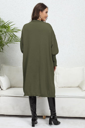 Army green long cardigan with balloon sleeves and ribbed cuffs.
