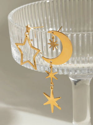 Gold celestial drop earrings with stars and moon, 18K gold-plated.