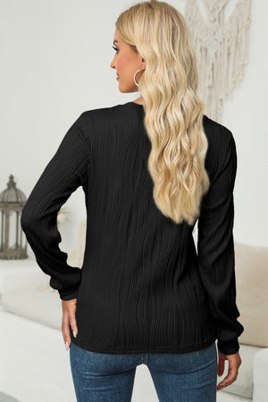 Black textured wave crewneck pullover with long sleeves.