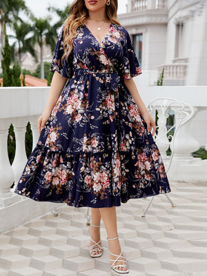 Midnight Bloom floral midi dress with flutter sleeves and tiered hem