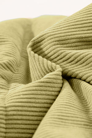 Corduroy padded collar vest in sage with visible texture detail.