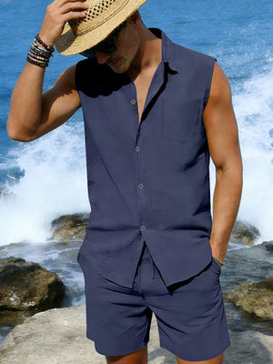Navy linen two-piece set for men, sleeveless collared shirt with pocket and drawstring shorts.