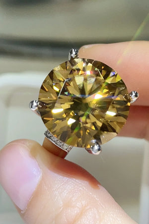 Gold radiant cut moissanite cocktail ring with pave band detail