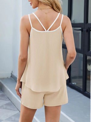 Tan ribbed lounge set with white contrast trim cami and shorts.