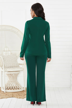 Emerald green flare leg pant suit with a classic blazer and wide leg pants.