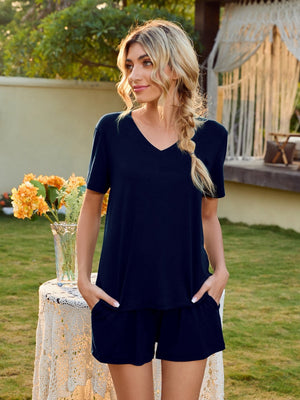Dark blue V-neck lounge set with shorts and short sleeves.