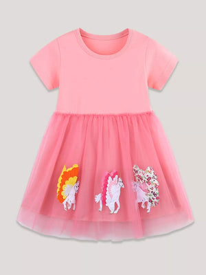 Pink cotton short sleeve dress with tulle skirt and unicorn appliques.