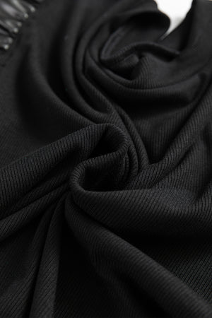 Black ribbed knit blouse with ruffled faux leather sleeve detail