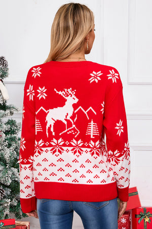 Red acrylic knit sweater with white reindeer, snowflake, and mountain Fair Isle pattern.