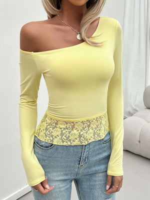 Light yellow off-shoulder blouse with lace trim detail