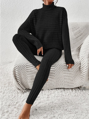 Black ribbed turtleneck lounge set with long sleeves and matching leggings.