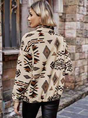Tan Aztec sherpa zip-up jacket with a mock neck and tribal print.