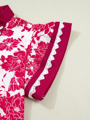 White and pink floral print polyester blouse with lace trim on sleeves and collar.