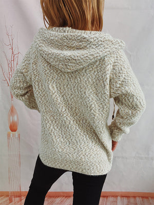 Speckled knit relaxed zip-up hoodie in cream with a textured pattern and hood.