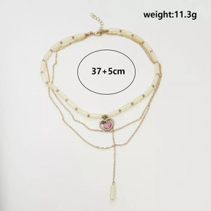 18k Gold-plated Layered Heart Pendant Necklace in Gold, fabric detail