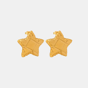 Textured gold star stud earrings with a celestial, cosmic design.