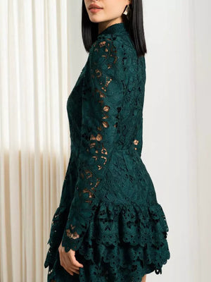 Dark green lace mock neck mini dress with tiered ruffle hem and long sleeves.