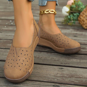 Coffee floral cutout slip-on loafers with breathable design.