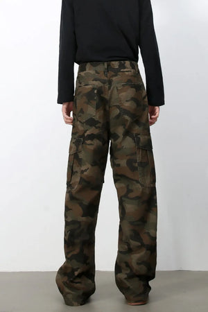 Cargo Camo Wide-Leg Utility Trousers in green camouflage with multiple cargo pockets.
