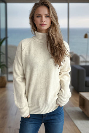 Cream speckled Donegal turtleneck sweater with ribbed cuffs and hem