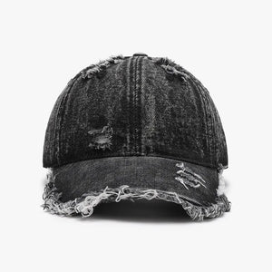 Dark acid wash denim baseball cap with frayed edges and distressed details.
