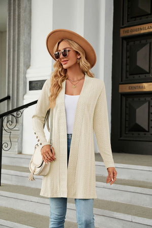 Ivory textured knit open-front duster cardigan with button detail on cuffs