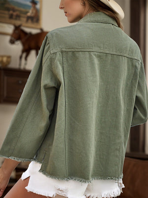 Moss denim shacket with raw edge cropped hem and sleeves.
