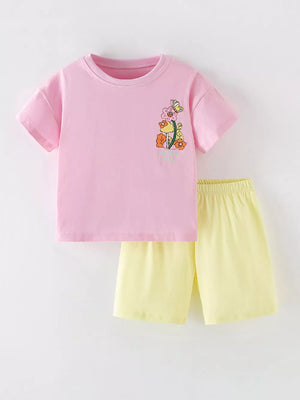 Pink floral graphic t-shirt and yellow shorts set, cotton blend, for girls.