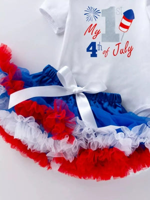Baby patriotic outfit with "My 1st 4th of July" graphic and ruffled tutu skirt.