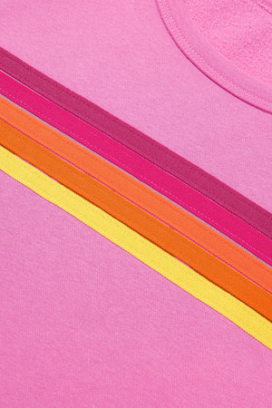 Fuchsia pink loungewear set with diagonal rainbow stripes