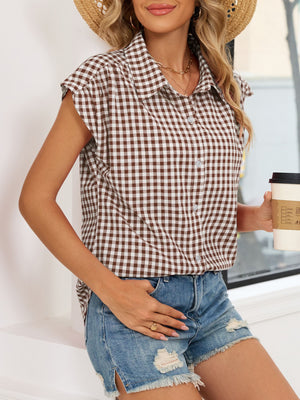 Brown gingham cotton shirt with cap sleeves and button-down front.