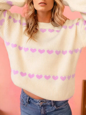 Cream acrylic blend sweater with allover purple heart pattern, crewneck, long sleeves.