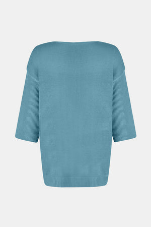 Pastel Blue V-neck knit sweater with flared sleeves and ribbed cuffs.