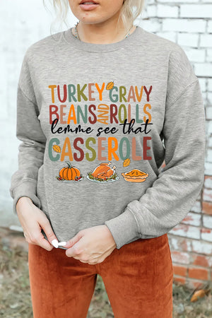 Gray graphic sweatshirt with Thanksgiving food print and text.