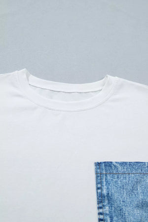 White cotton tee with a blue denim pocket detail.