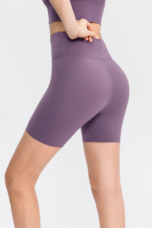 Mauve bike shorts with a high waist and subtle pocket detail.