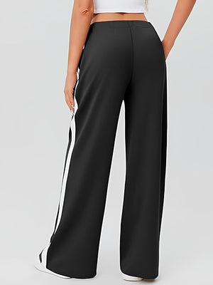 Black palazzo trousers with white side stripe detail