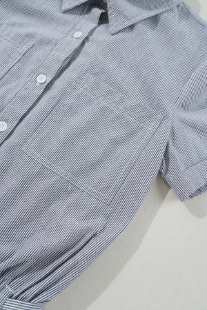 Pinstripe romper with shirred waist and chest pockets.