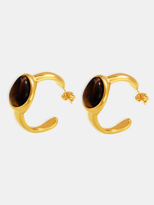 Gold hoop earrings with oval tiger's eye stones